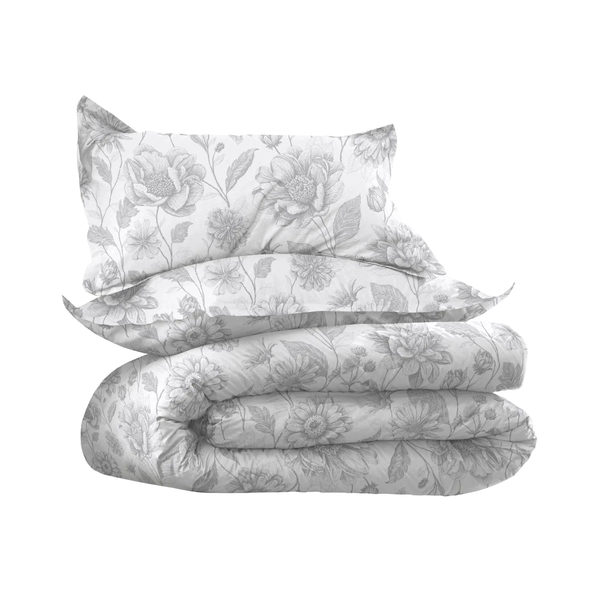 Floral patterned bedding set with comforter and pillowcases on a white background