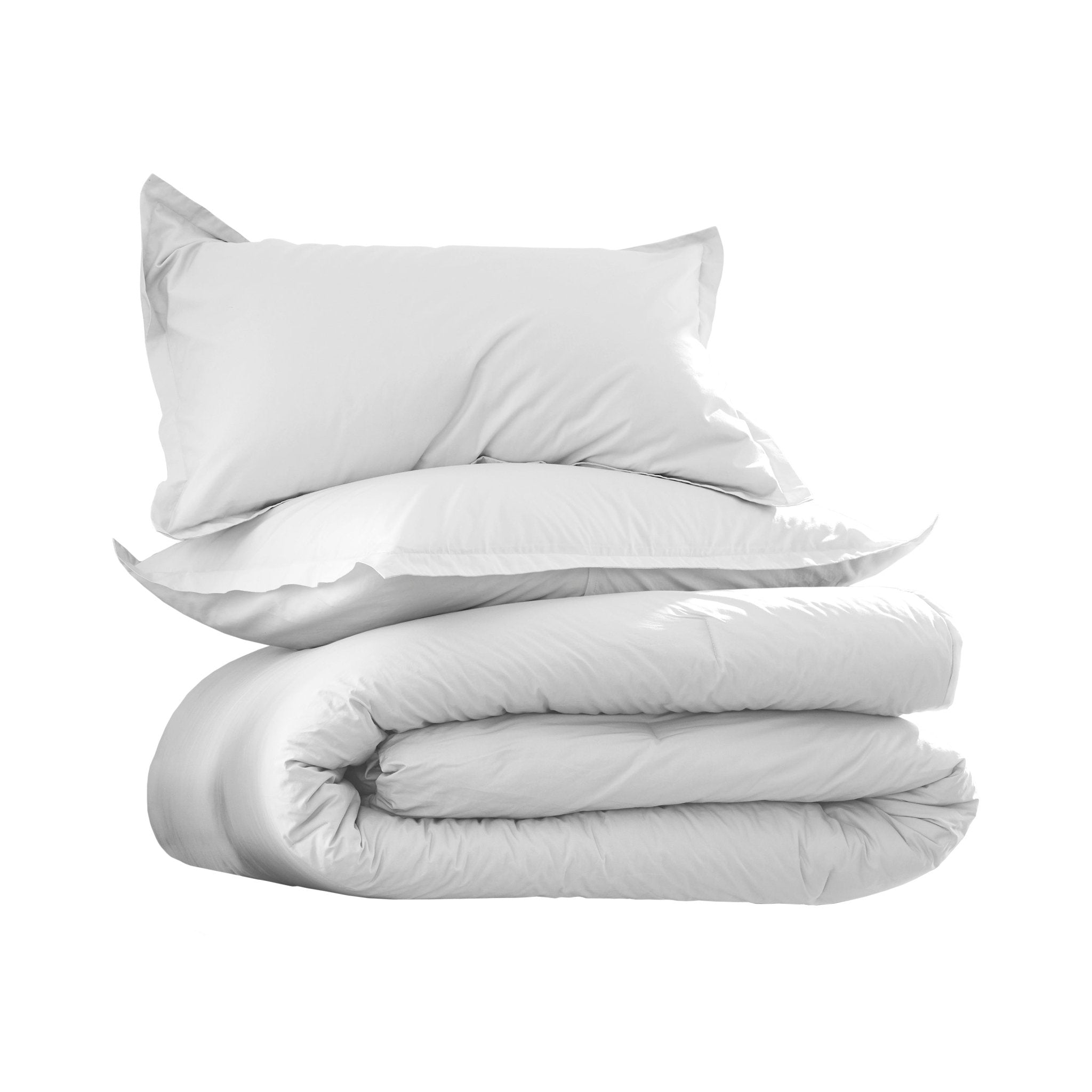 Folded soft white comforter set on a white background