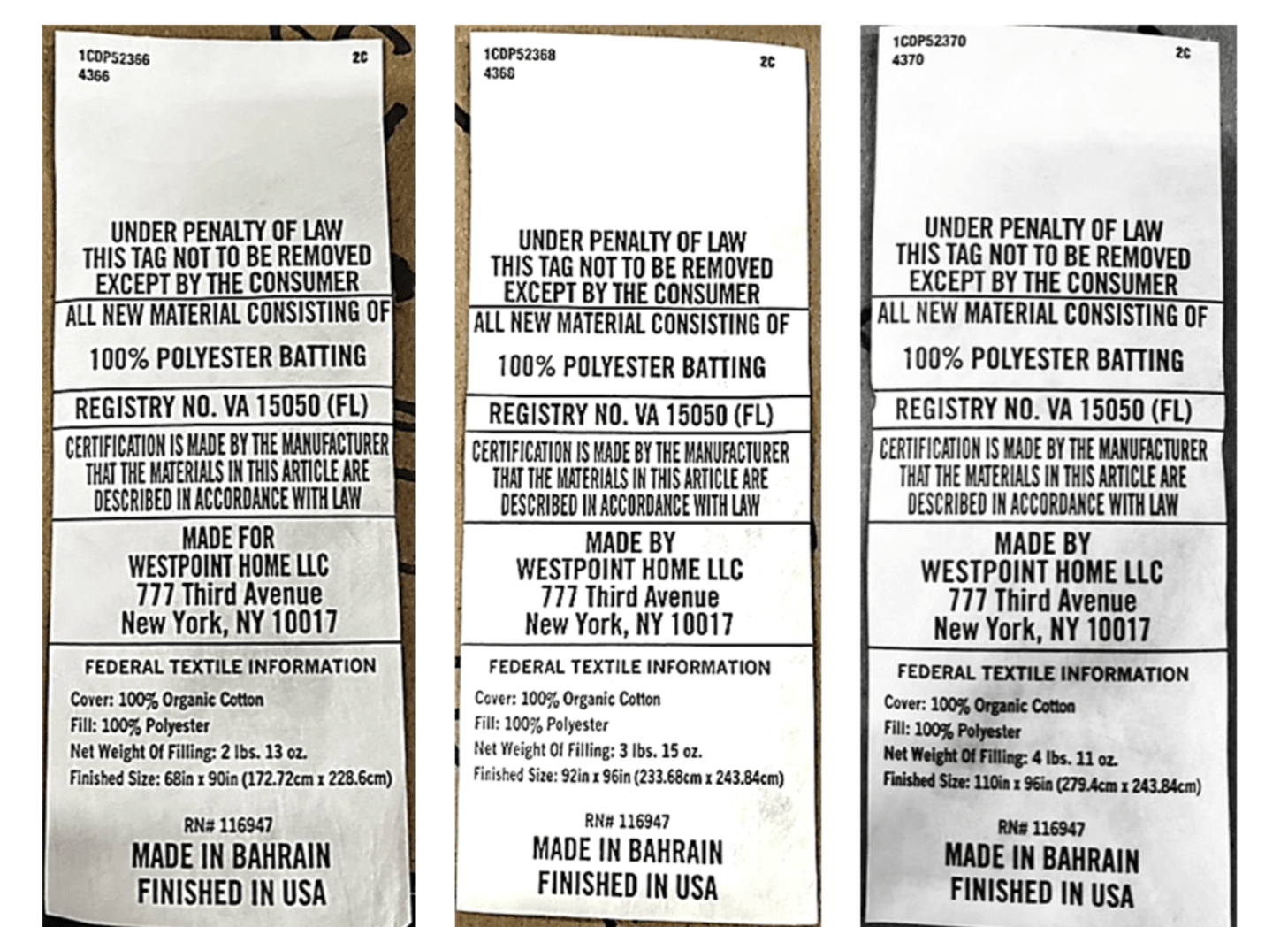 Three identical labels with text and branding information on a wooden surface.