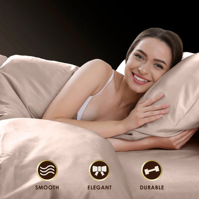 Woman lying on a bed with a comforter, surrounded by product features icons labeled 'Smooth', 'Elegant', and 'Durable'.