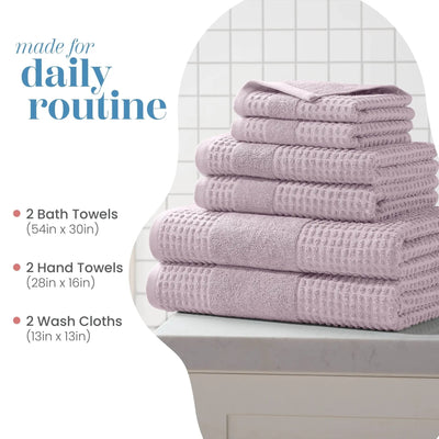 Set of lilac towels including bath towels, hand towels, and washcloths on a white surface with text indicating size and purpose.