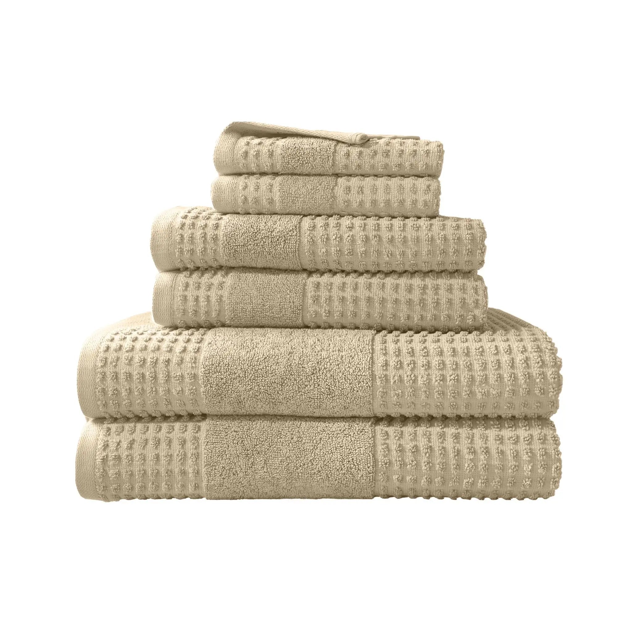 Stack of sand towel set on a white background