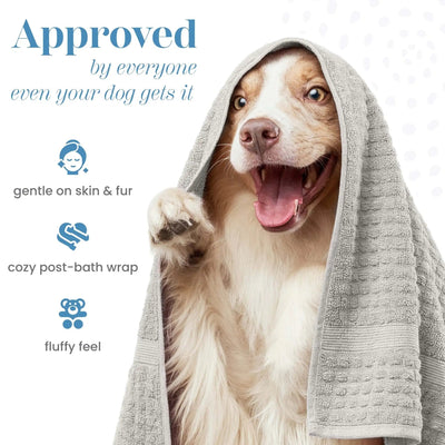 Dog wrapped in a grey towel with text about product benefits on a white background