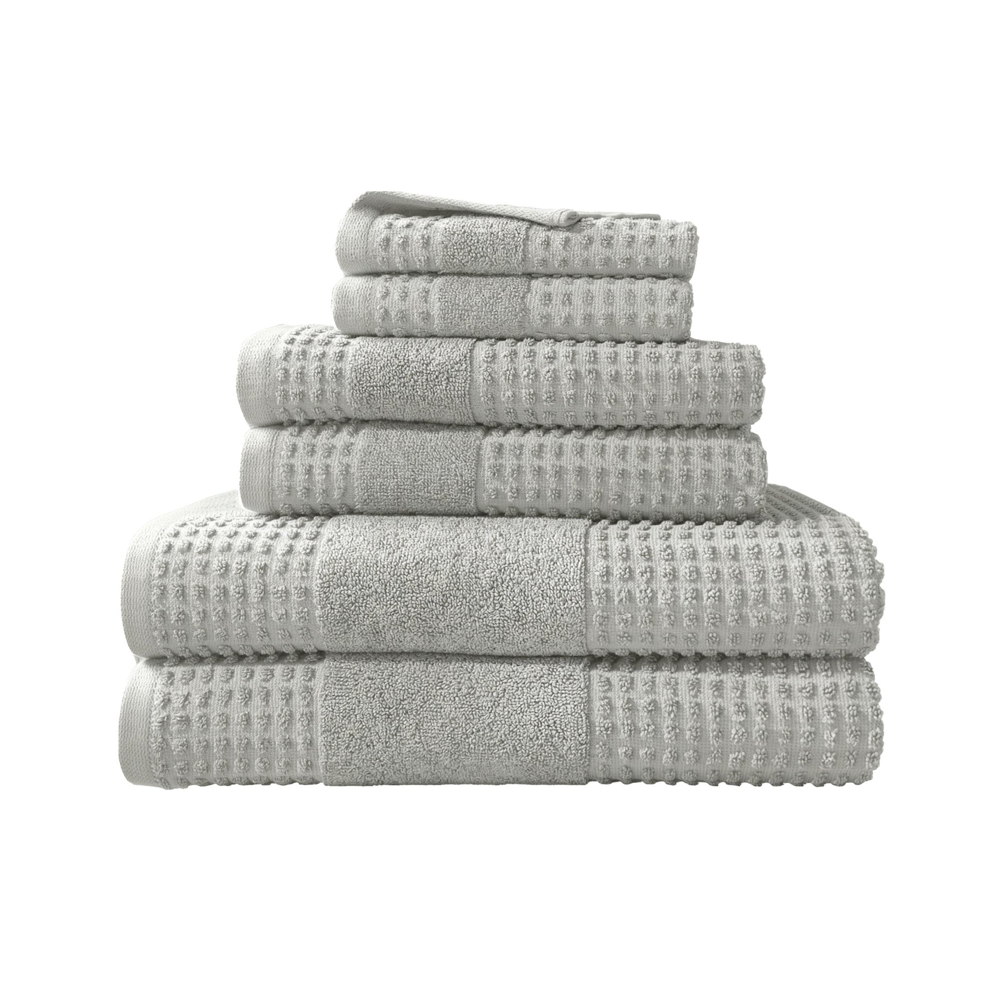 Stack of gray towels on a white background