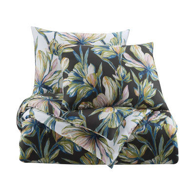 Floral patterned comforter set on a white background