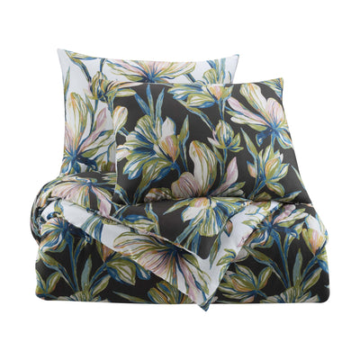 Floral patterned comforter set on a white background