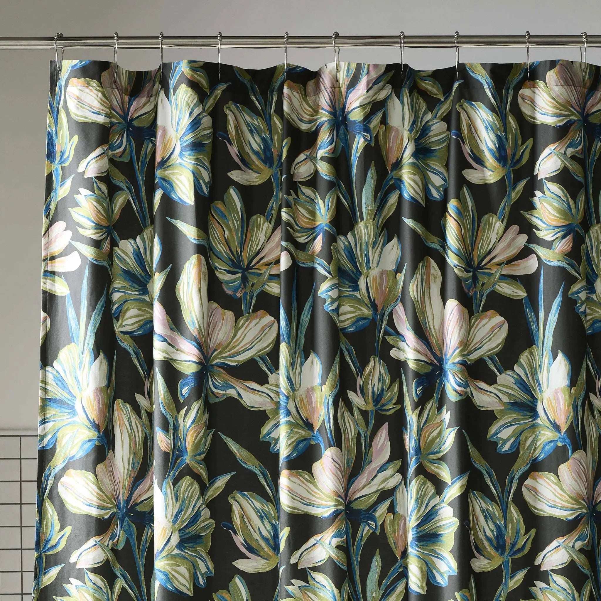 Floral patterned shower curtain with a dark background
