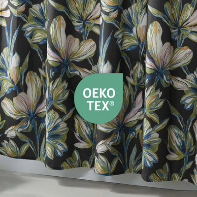 Floral-patterned fabric with OEKO-TEX logo on a dark background