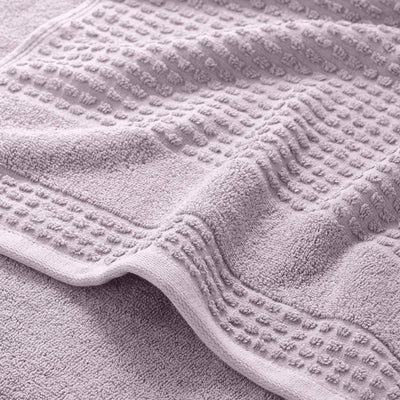 Close-up of a textured lilac bath towel