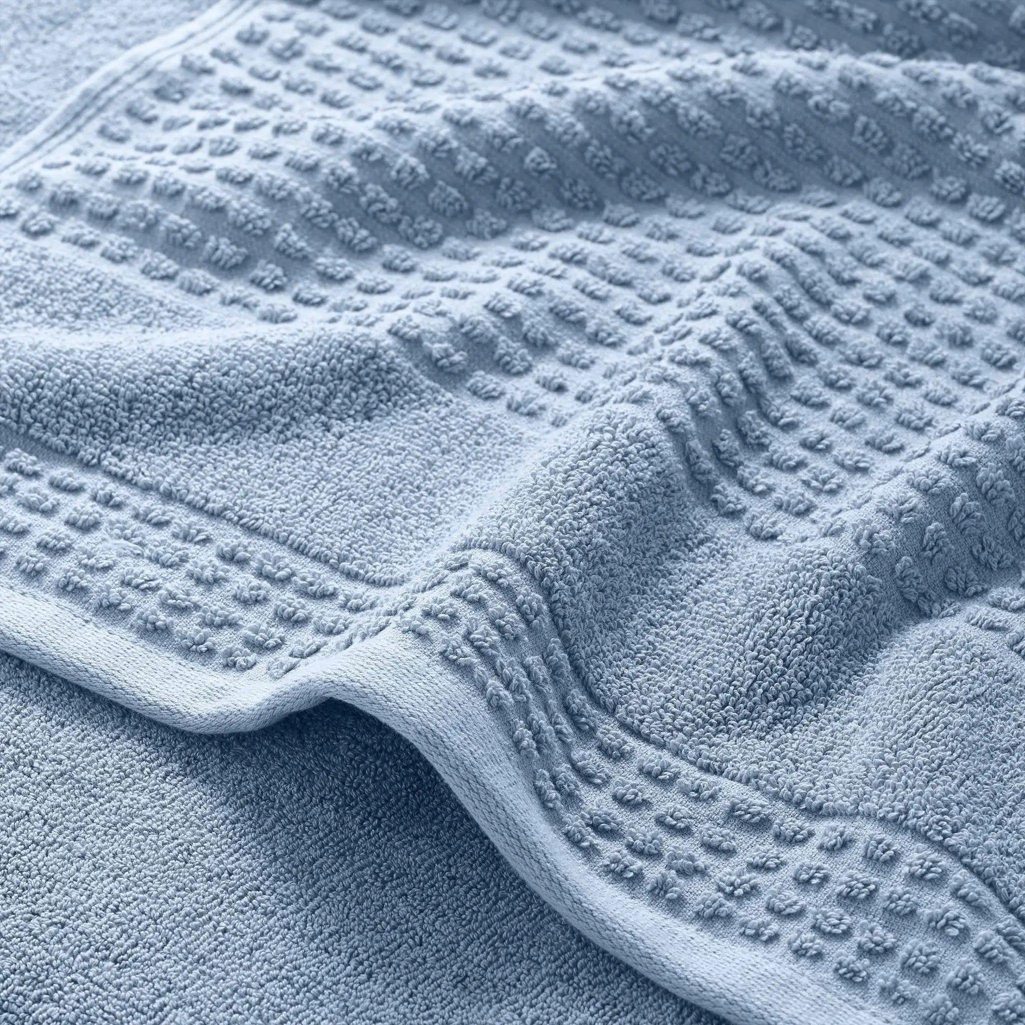 Close-up of a textured blue bath towel