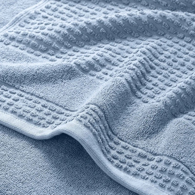 Close-up of a textured blue bath towel
