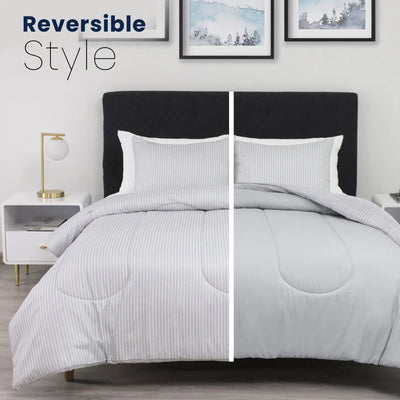 Gray striped comforter set on a bed with 'Reversible Style' text above.
