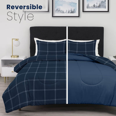 Navy blue checkered comforter set on a bed with reversible style text above.