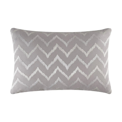 A square decorative throw pillow featuring a textured, woven chevron pattern in light gray and white, shown against a plain white background.
