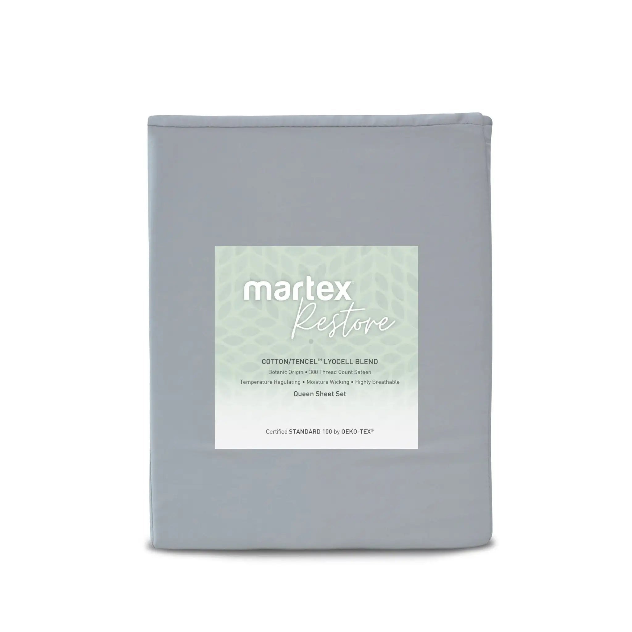 A folded gray bedding sheet set package with a white and pale green Martex Restore label, shown against a plain white background.