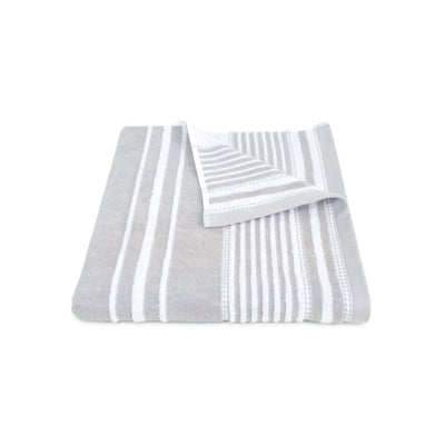 Gray and white striped bath towel on a white background