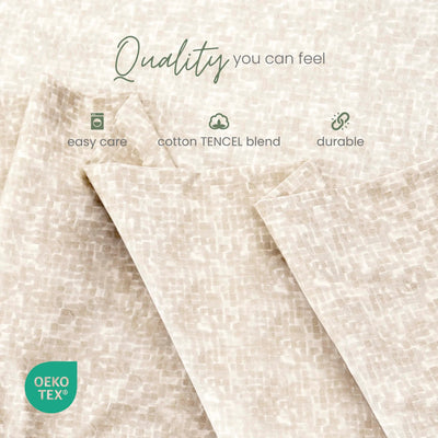 Beige textured fabric with a subtle woven pattern, shown folded with marketing text reading 'Quality you can feel' and feature icons for easy care, cotton TENCEL blend, and durable. An OEKO-TEX logo appears in the lower left.