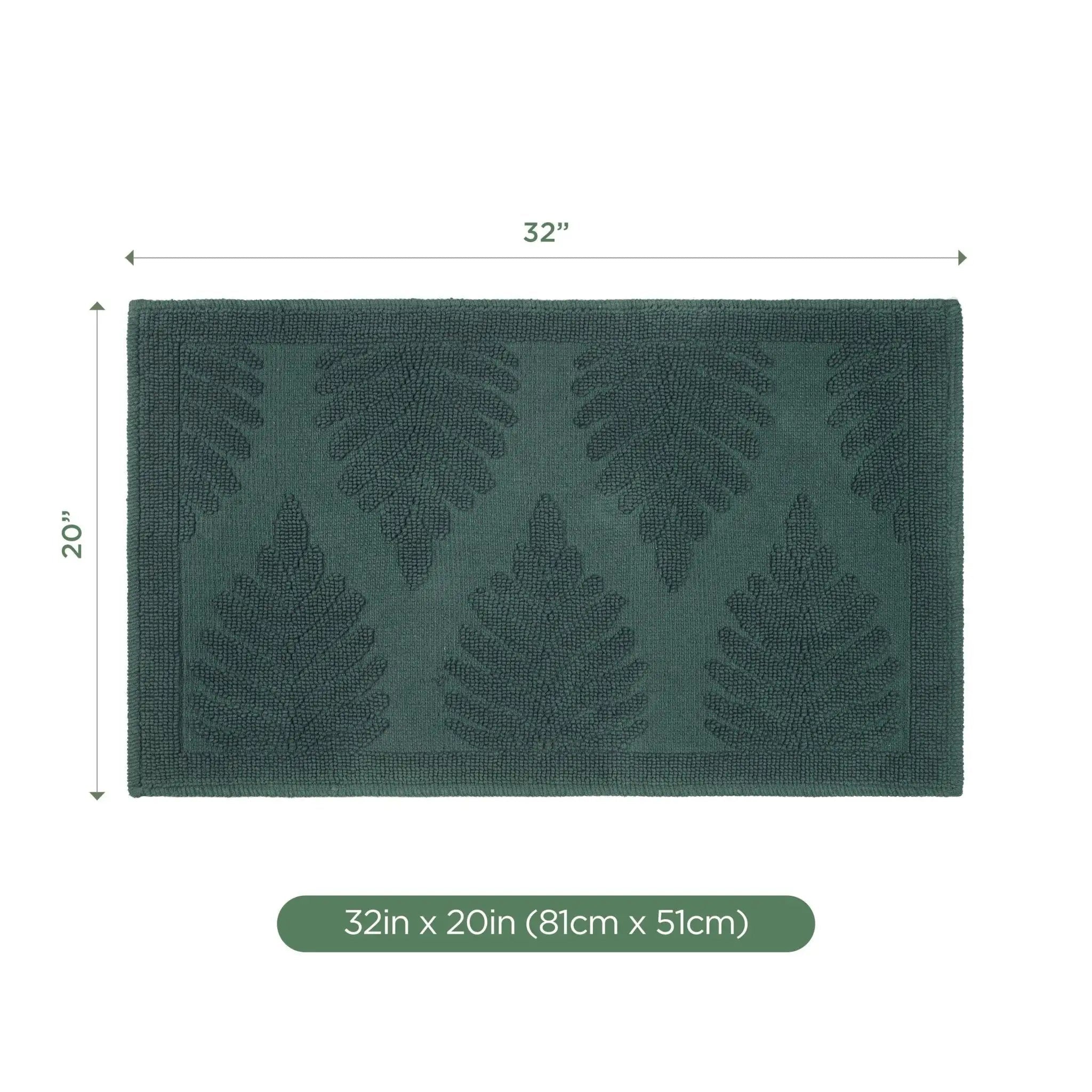 A rectangular jade bath rug with a raised fern pattern, shown with dimension lines indicating 32 inches by 20 inches, plus a size label at the bottom.