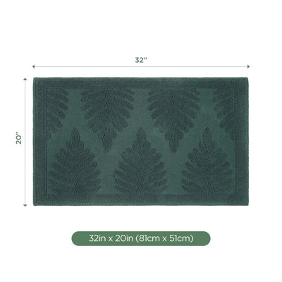 A rectangular jade bath rug with a raised fern pattern, shown with dimension lines indicating 32 inches by 20 inches, plus a size label at the bottom.