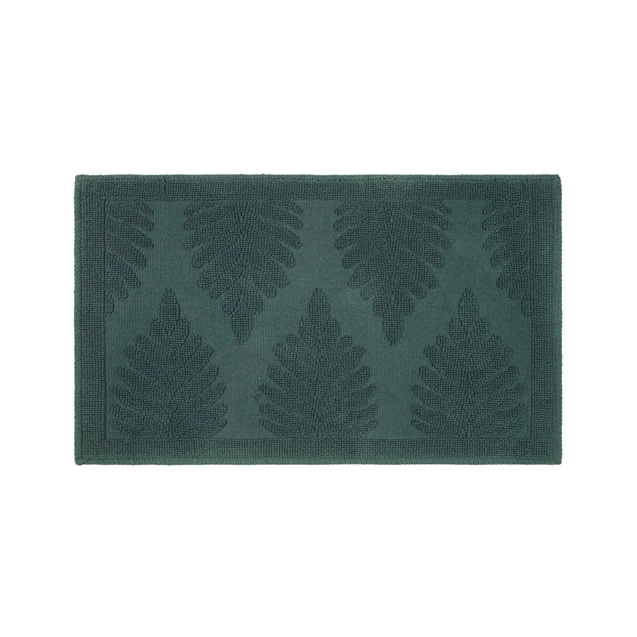 A rectangular jade bath rug featuring a raised embossed fern leaf pattern, shown flat against a solid white background.