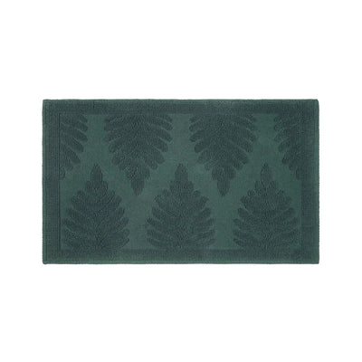 A rectangular jade bath rug featuring a raised embossed fern leaf pattern, shown flat against a solid white background.