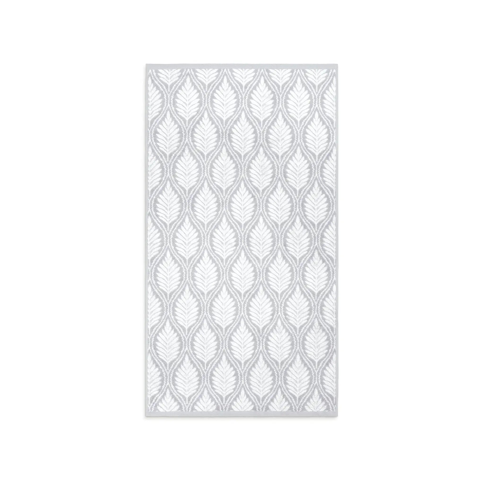 A Grey bath towel with vertical leaf pattern in white and light gray, shown flat against a solid white background.