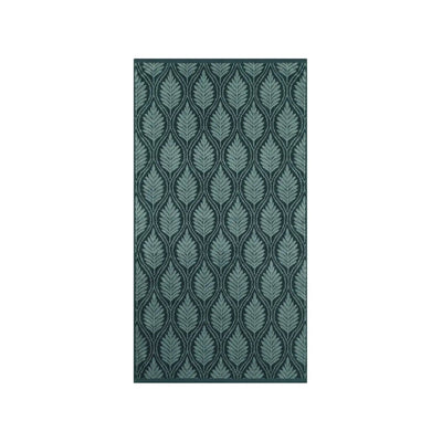 A jade bath towel with vertical leaf pattern in shades of teal and dark green, shown flat against a solid white background.