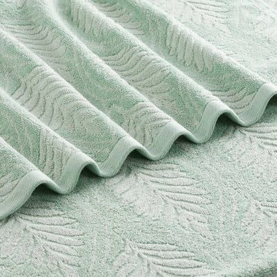Textured sage fabric with wavy pattern