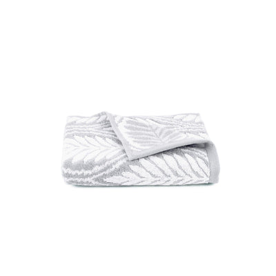 Grey textured hand towel on a white background