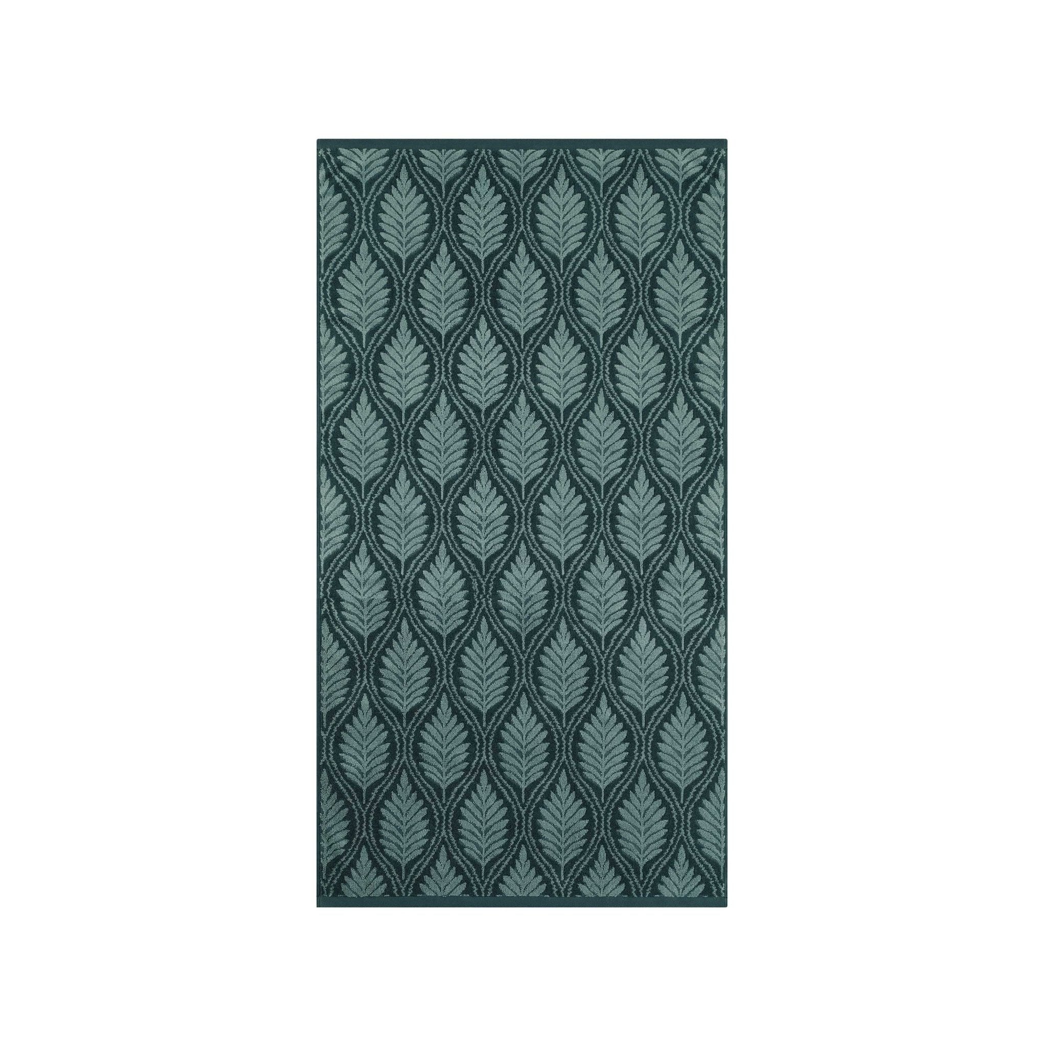 Jade patterned towel on a white background