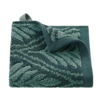 Jade textured washcloth with a pattern on a white background