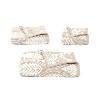 Set of sand textured towels on a white background