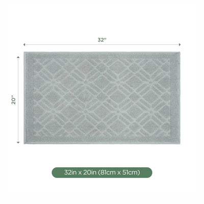 Gray bath rug with geometric pattern and measurements on a white background