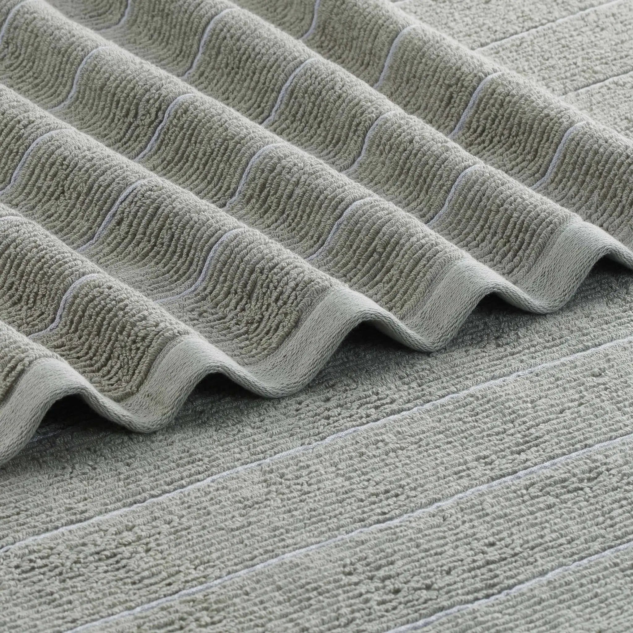 Close-up of a textured gray surface with wavy patterns