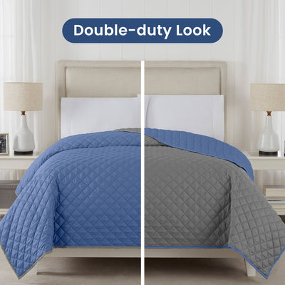 Two views of a Ceil blue/grey reversible coverlet draped over it, one in ceil blue and one in gray, on a neutral background.