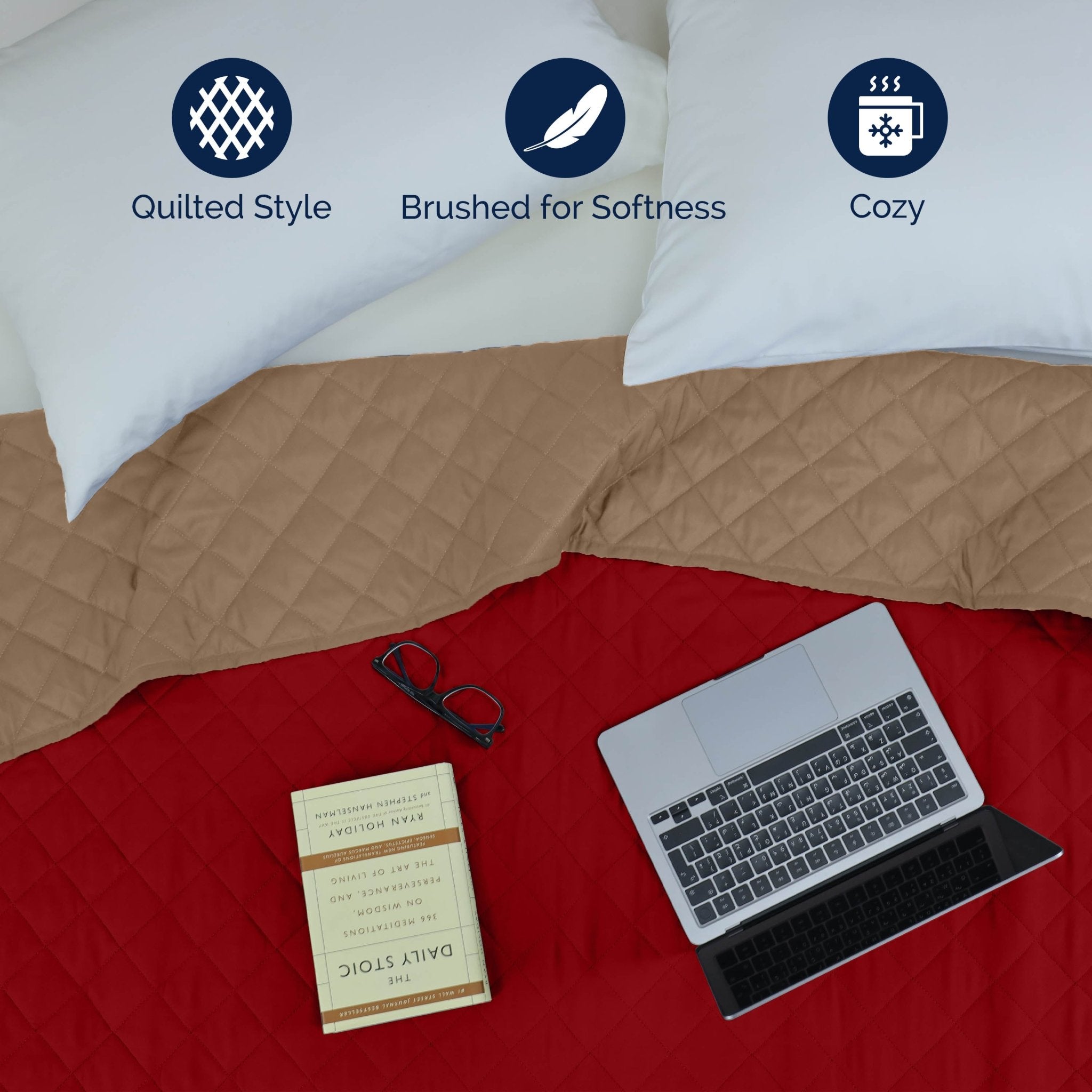 Khaki/red quilted coverlet with laptop and book on a bed, featuring icons for quilted style, softness, and coziness.