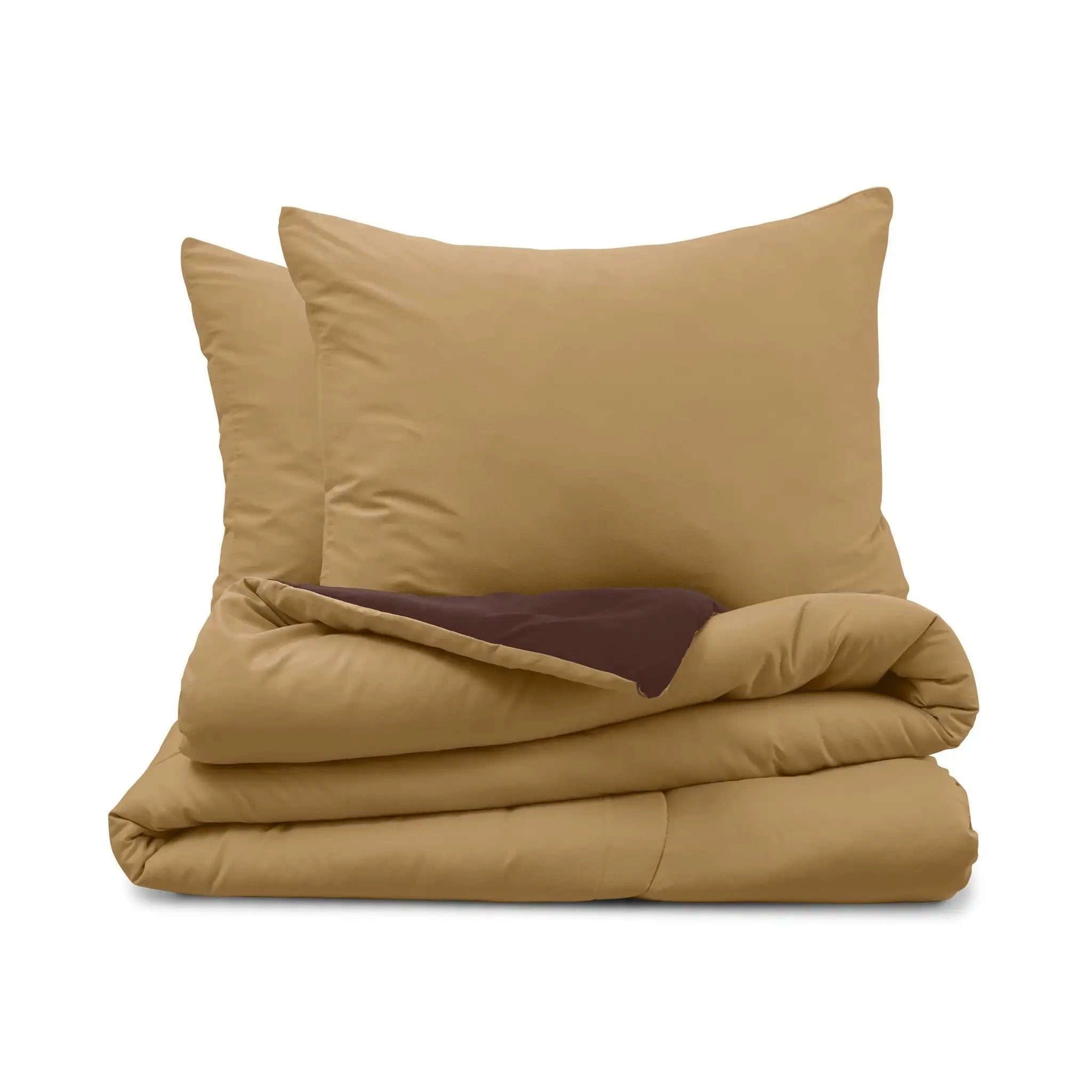 Folded khaki comforter with two pillow shams on a white background