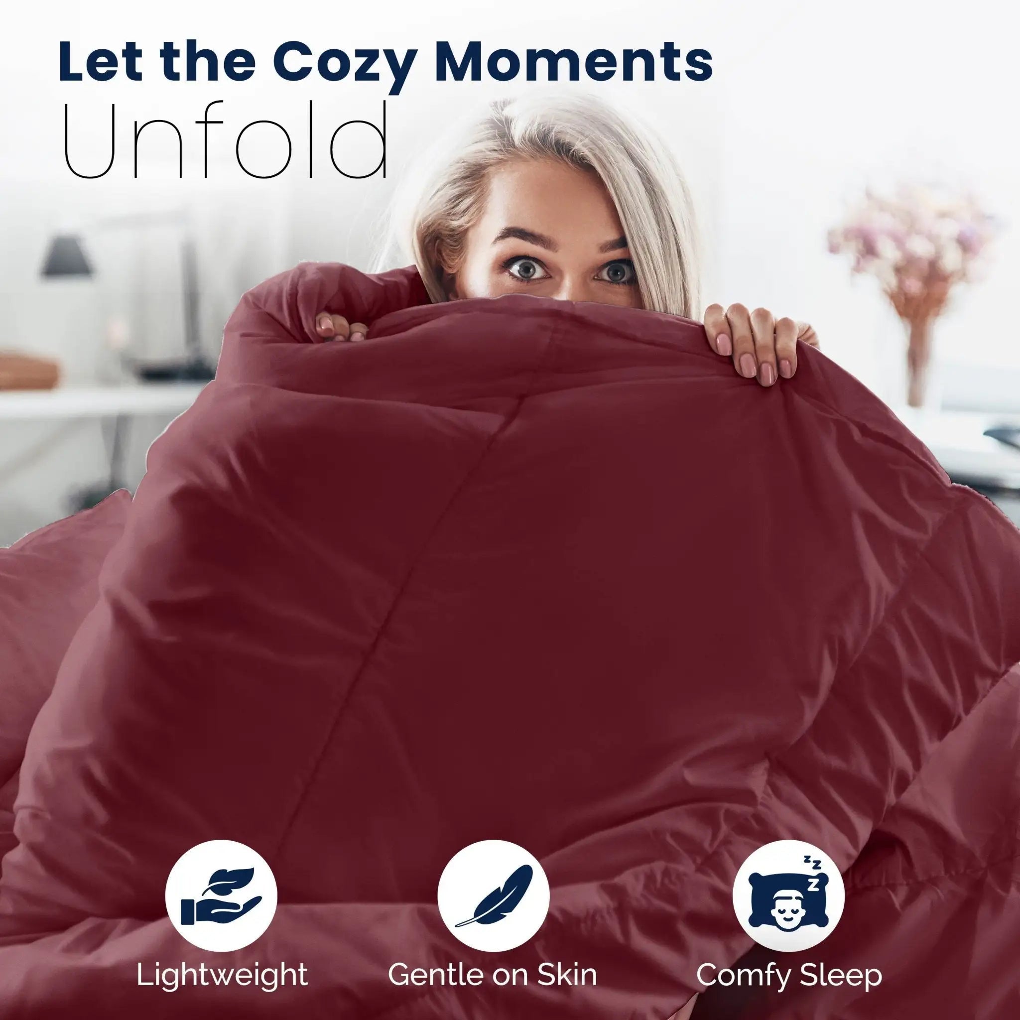 A woman peeks over a burgundy quilted comforter in a bright bedroom setting, with promotional text reading 'Let the Cozy Moments unfold' and feature icons for lightweight, gentle on skin, and comfy sleep.
