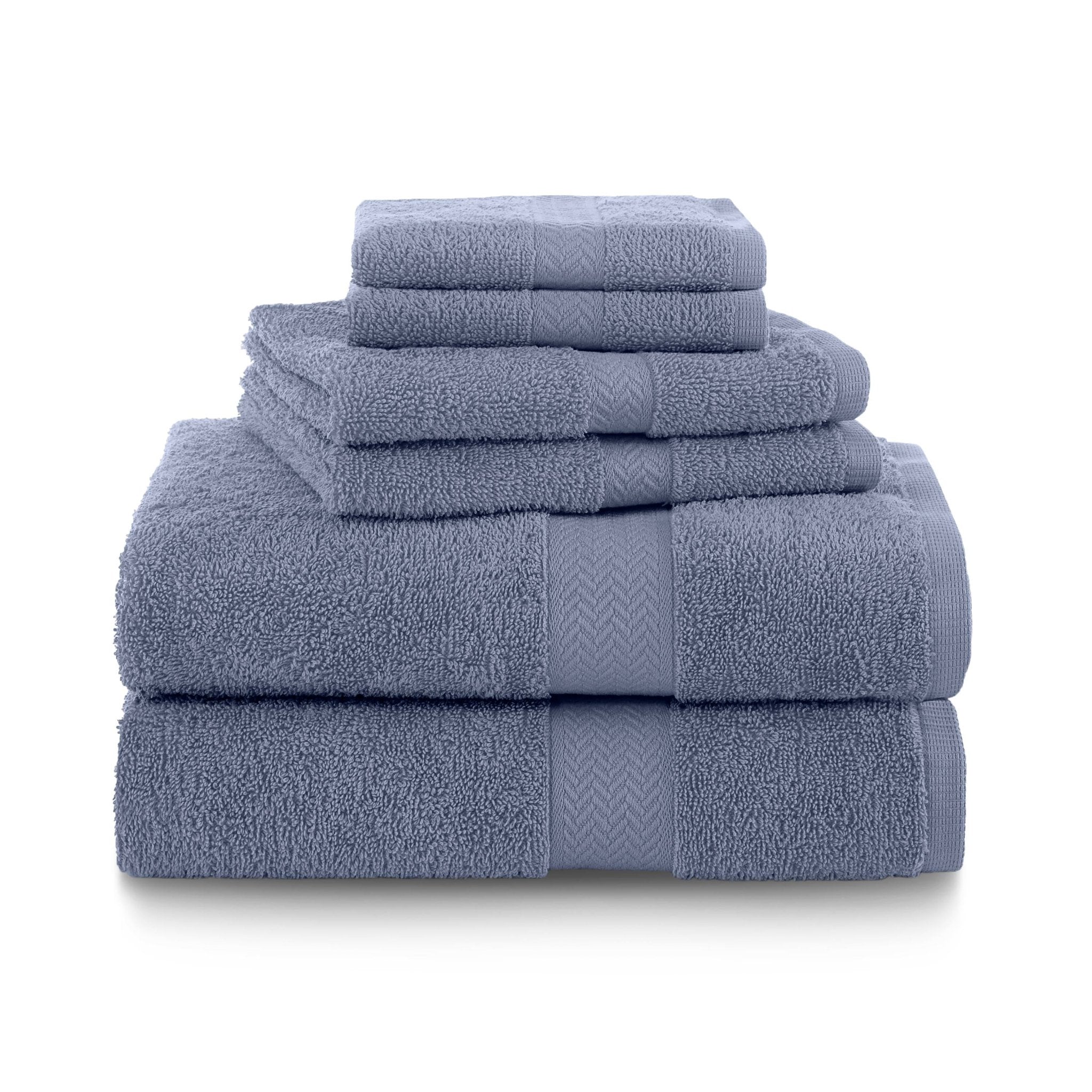 Set of heather blue towels stacked on a white background