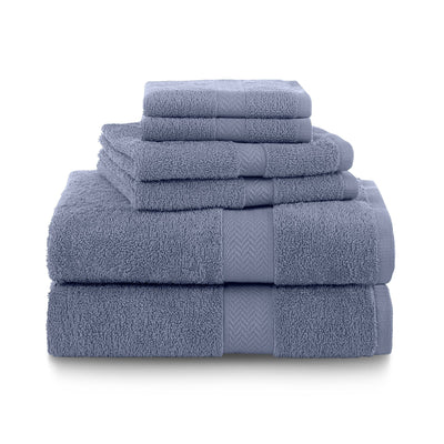 Set of heather blue towels stacked on a white background