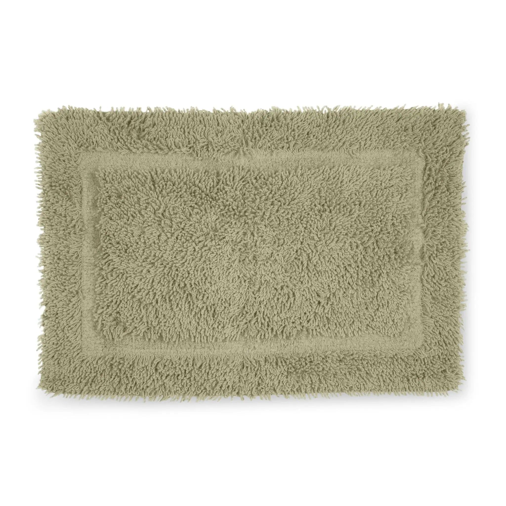 A sea green bath rug shown flat against a solid white background.
