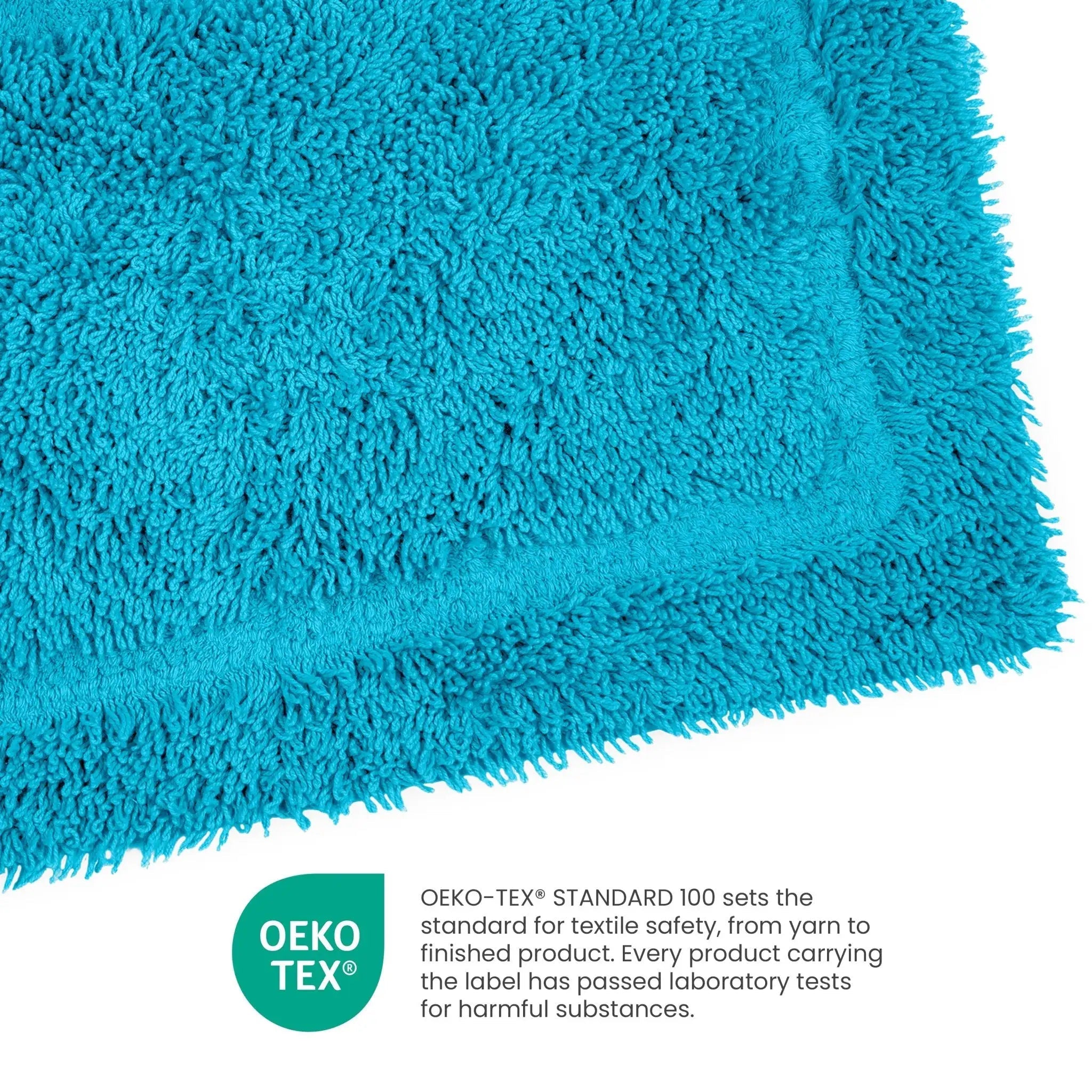 Close-up of a aqua textured fabric with OEKO-TEX certification label.