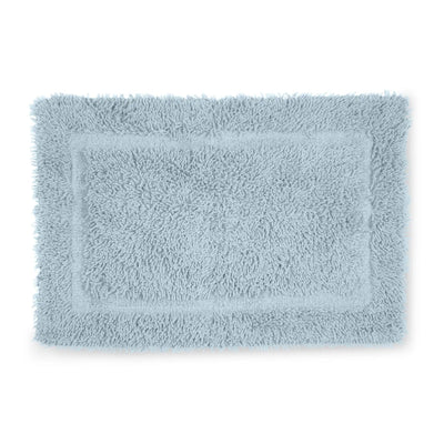 Light blue bath rug on a white background