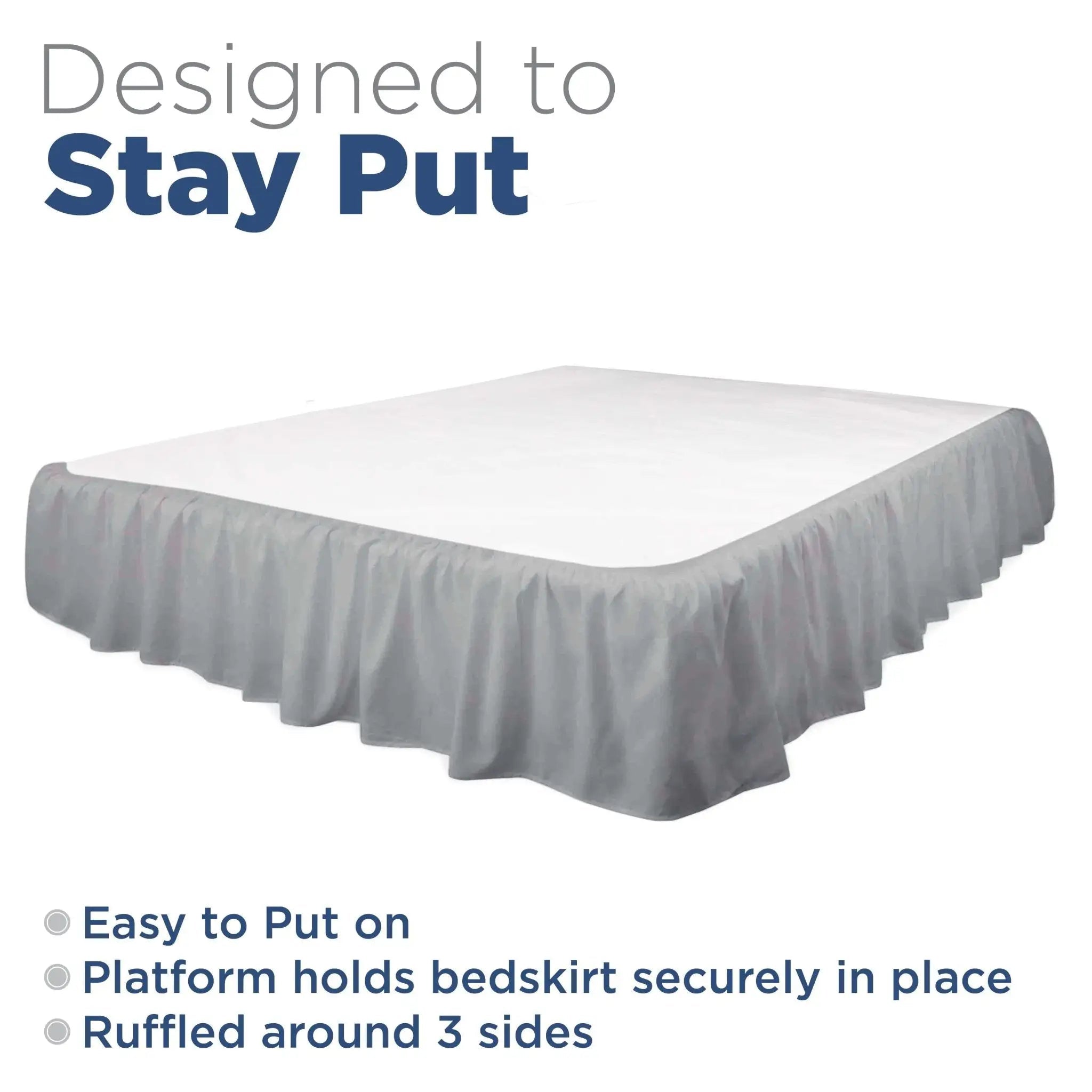A bed skirt in grey shown on a bed with a white mattress, with text reading 'Designed to Stay Put' and feature bullet points on a white background.