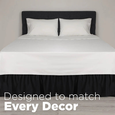 A neatly made bed and a black bed skirt. Large white text at the bottom reads, 'Designed to match Every Decor.