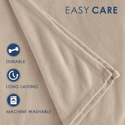 Close-up of a beige textured blanket with a folded corner, overlaid with blue text reading 'EASY CARE' and icons for durable, long lasting, and machine washable features.