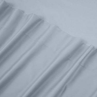 Stack of blue sheets with a textured surface