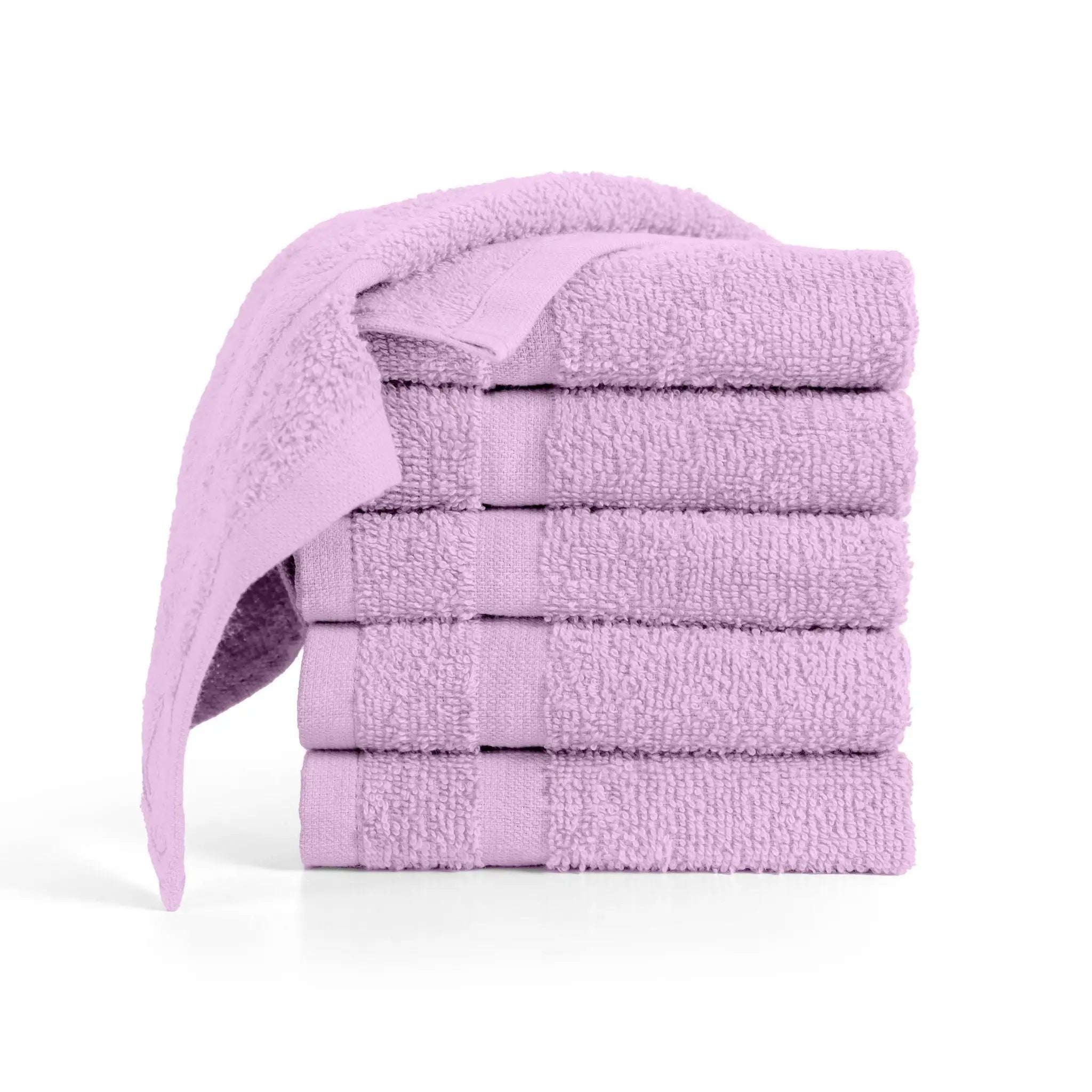 Stack of lilac washcloths on a white background