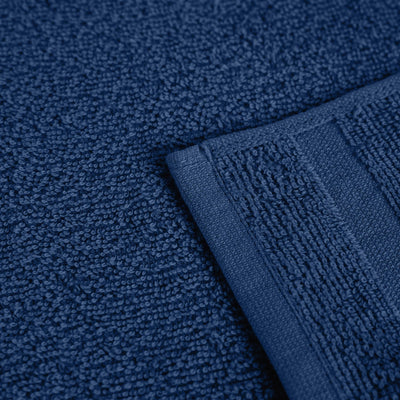 Close-up of a textured navy fabric with a folded edge