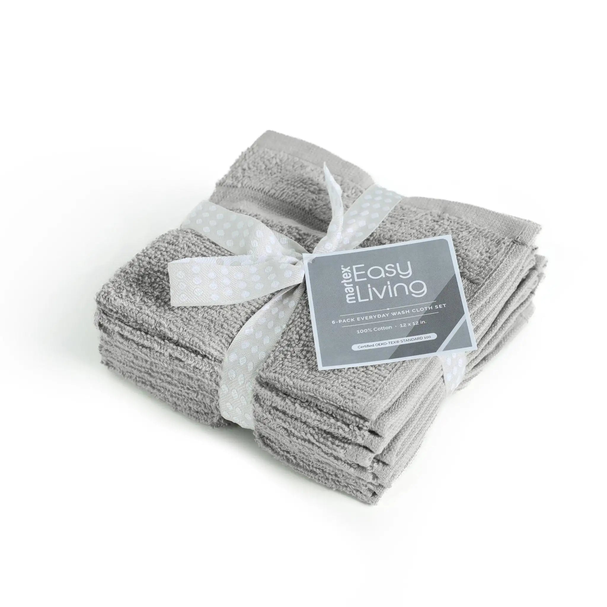 Stack of gray washcloths with a white ribbon and 'Martex Easy Living' label on a white background